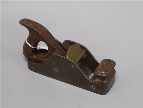 A 19th century steel and walnut carpentry plane, stamped Thos. Williams